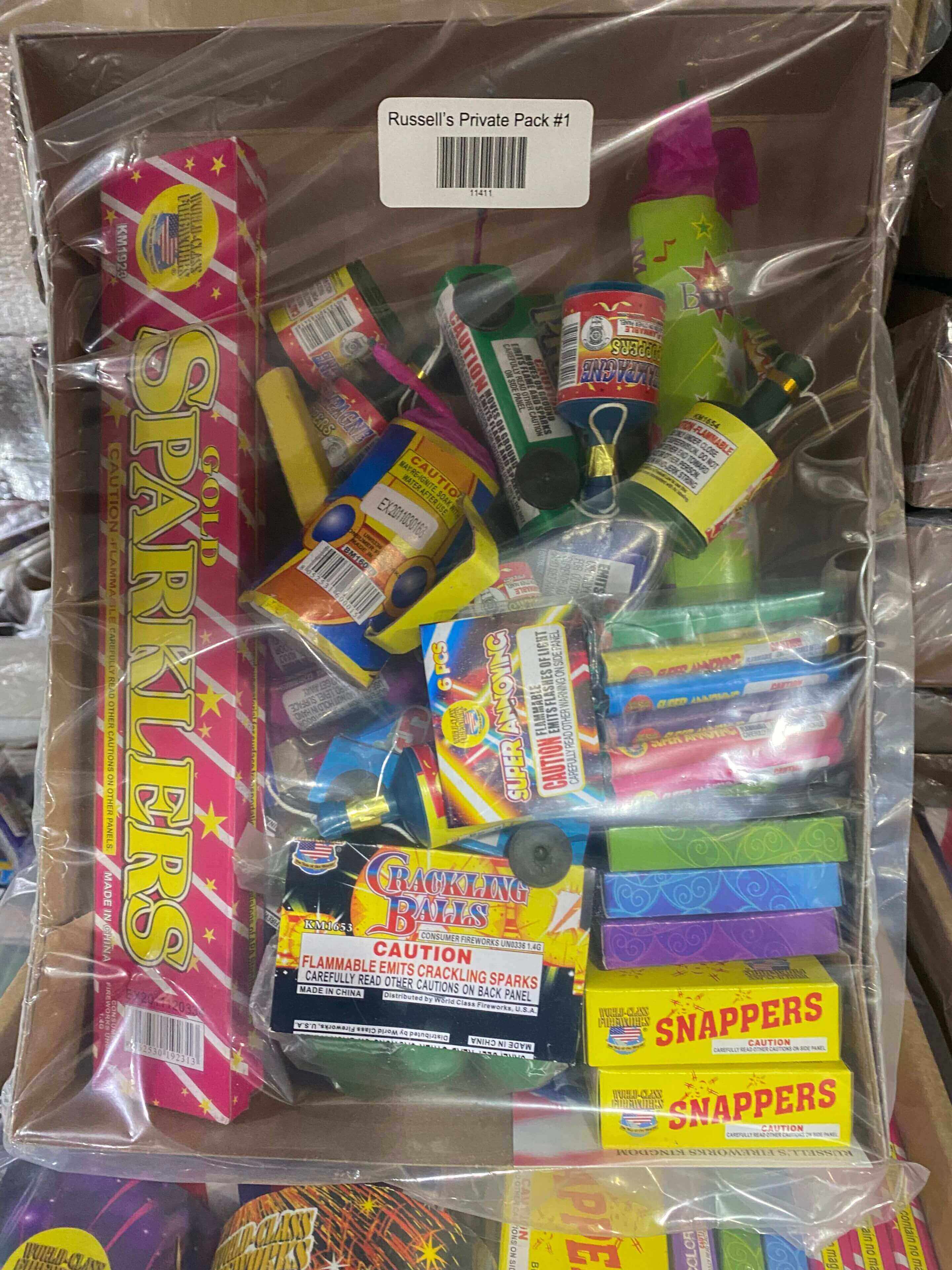 Box of assorted fireworks and sparklers.
